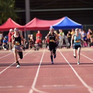 Three female athletes racing