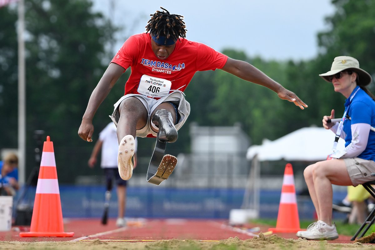 Athlete with leg amputation competing in long jump