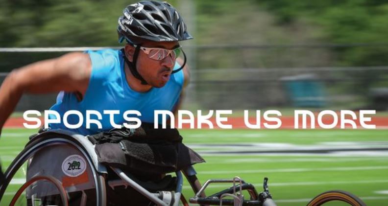 A person cycling on an outdoor track